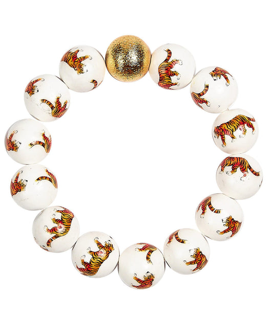 Bracelet with tiger-themed beads on a white background
