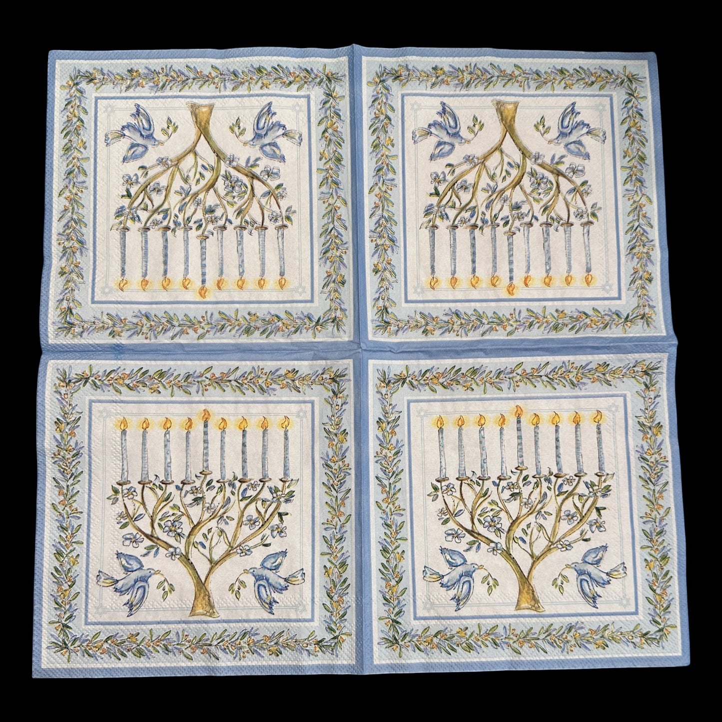 Loblolly Girl Roseanne Beck Menorah Luncheon Decoupage Napkins, set of 2, featuring a blue and white menorah with lit candles and blue birds, framed by a floral border.