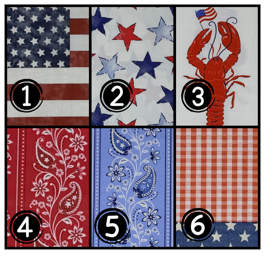 A collection of patriotic summer decoupage paper napkins showing six Americana designs including bold tossed stars, a red lobster with American flag, a rustic flag, red bandana paisley, blue bandana paisley, and red gingham with blue star border on a white background.